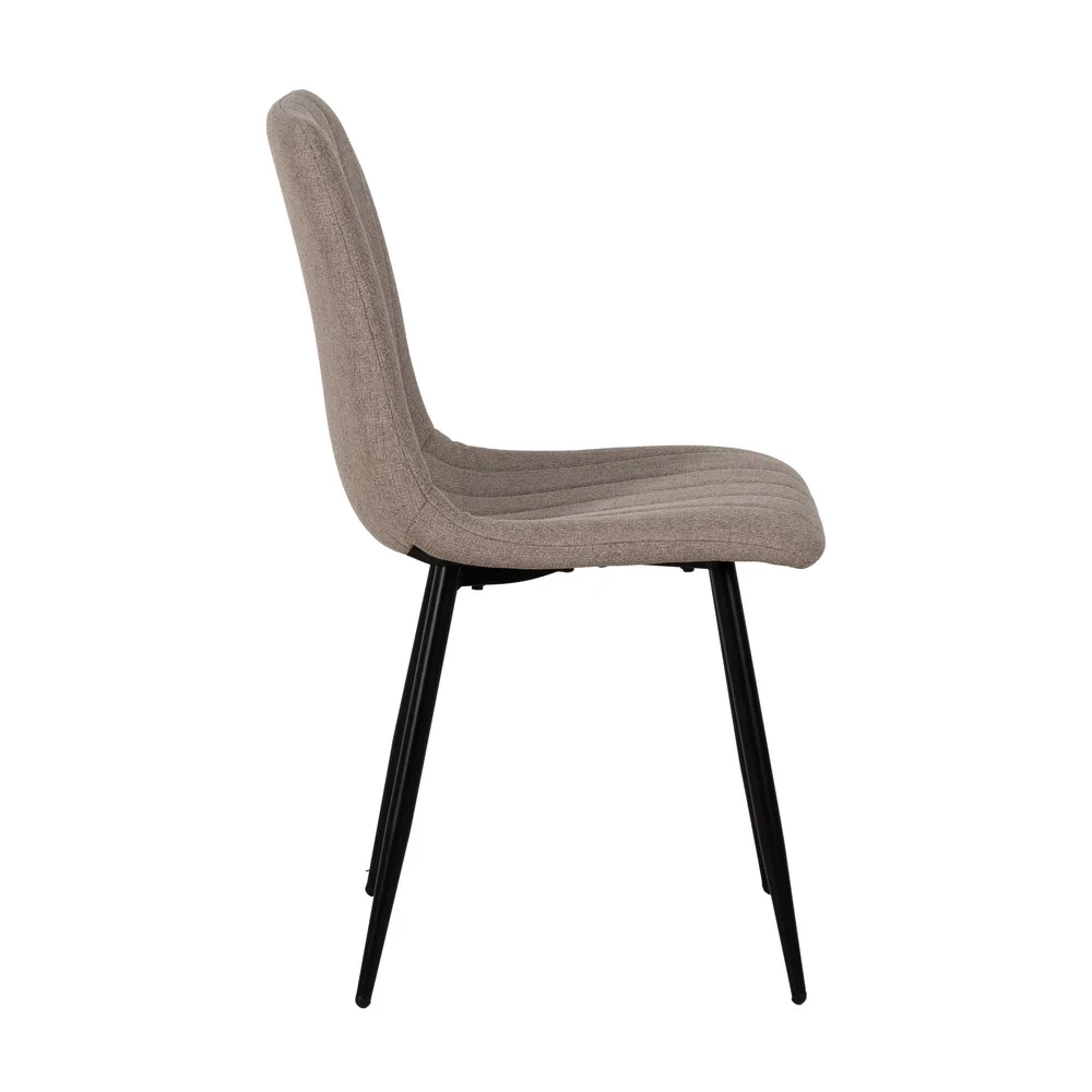 Detalle del tapizado de la silla beige de salón