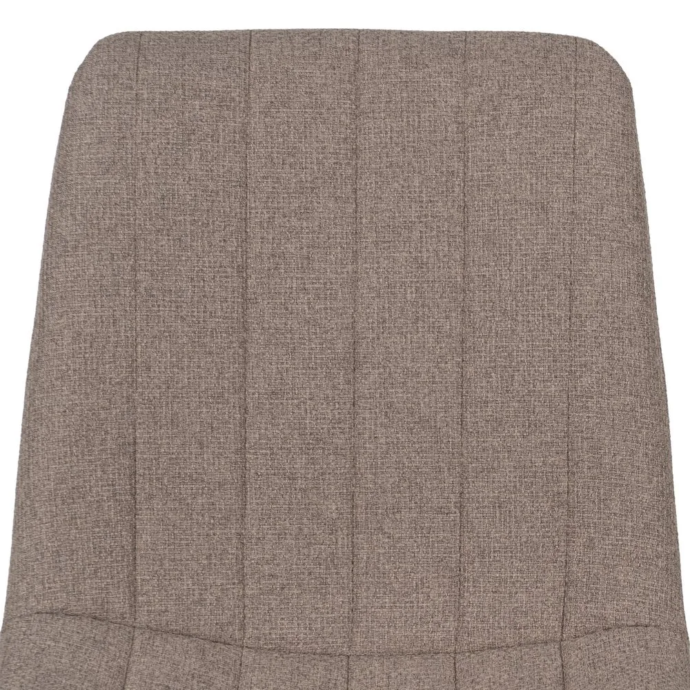 Detalle del asiento de la silla beige de salón